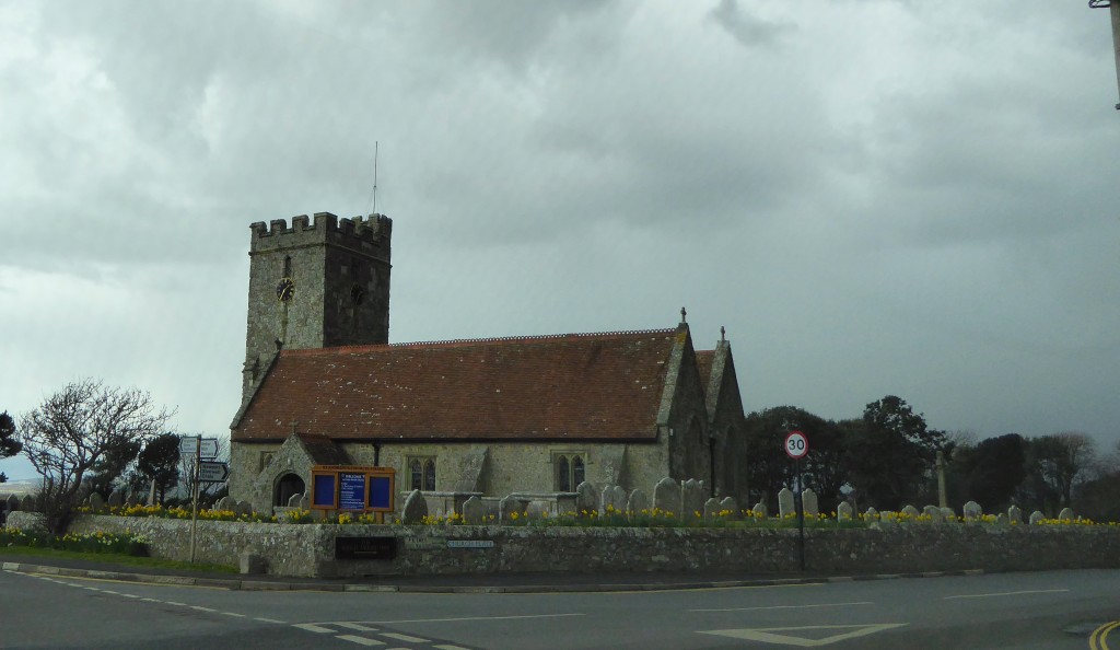 Church with daffodils in the gardens