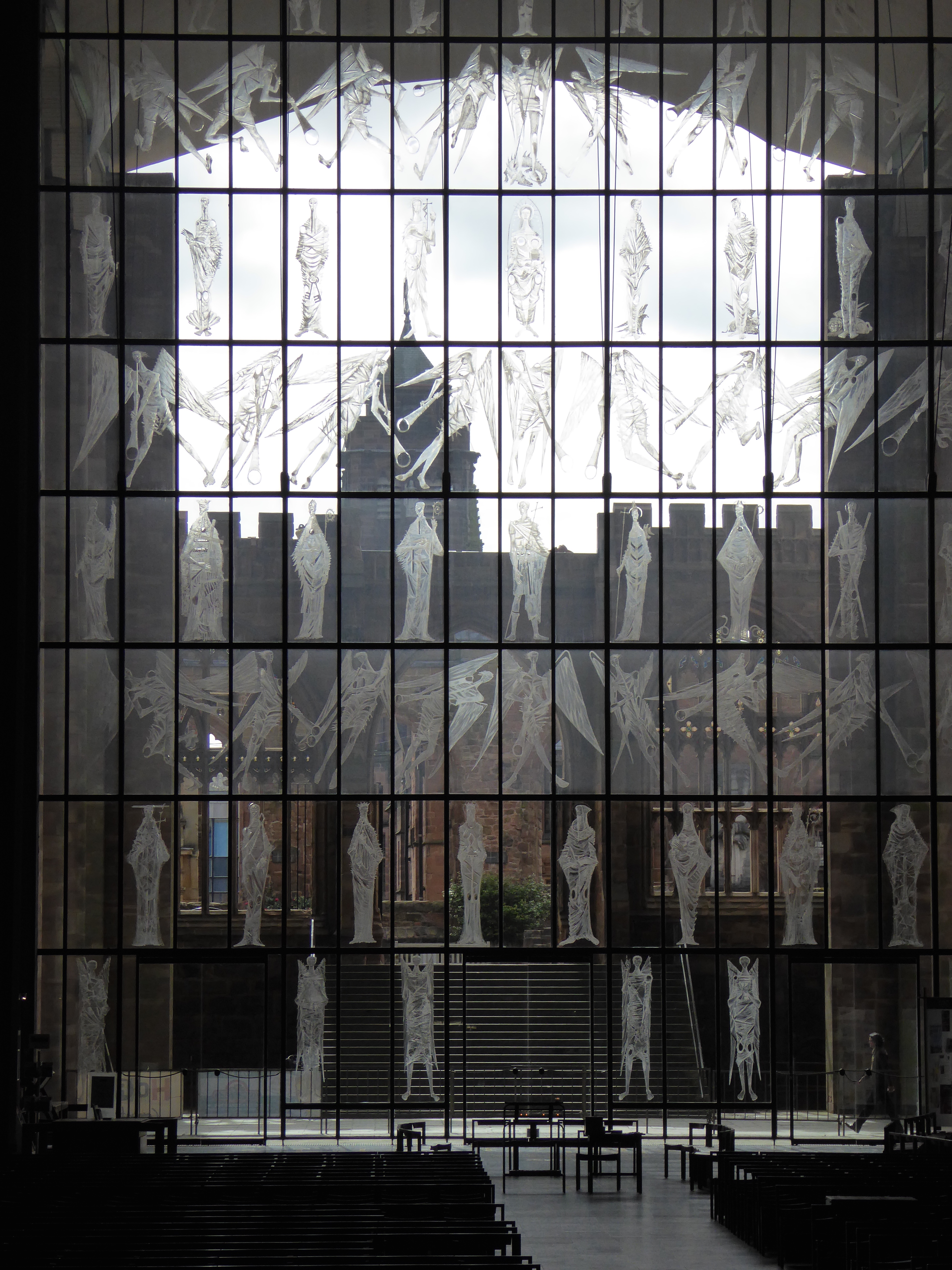 Ruined Cathedral viewed through glass wall of angels