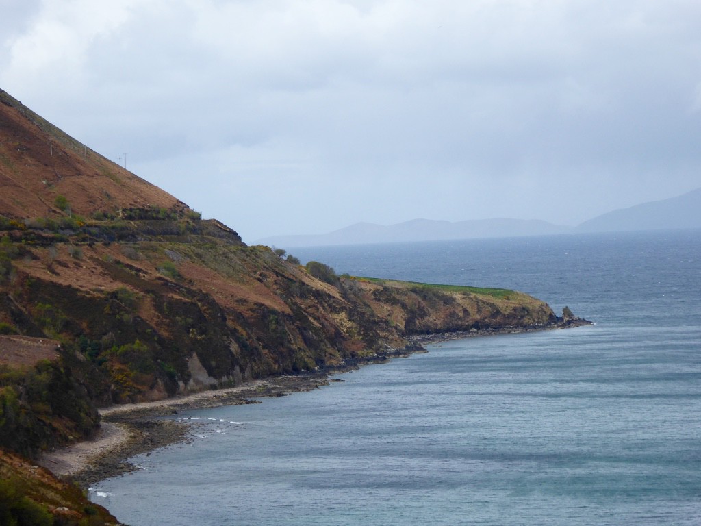 Heading for Portmagee with track hugging the rugged mountains