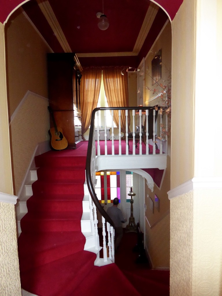 Hallway from our room with beautiful front door