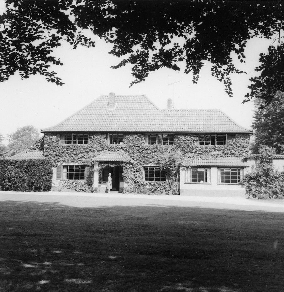 Our home in Fleet with my grandmother in the doorway