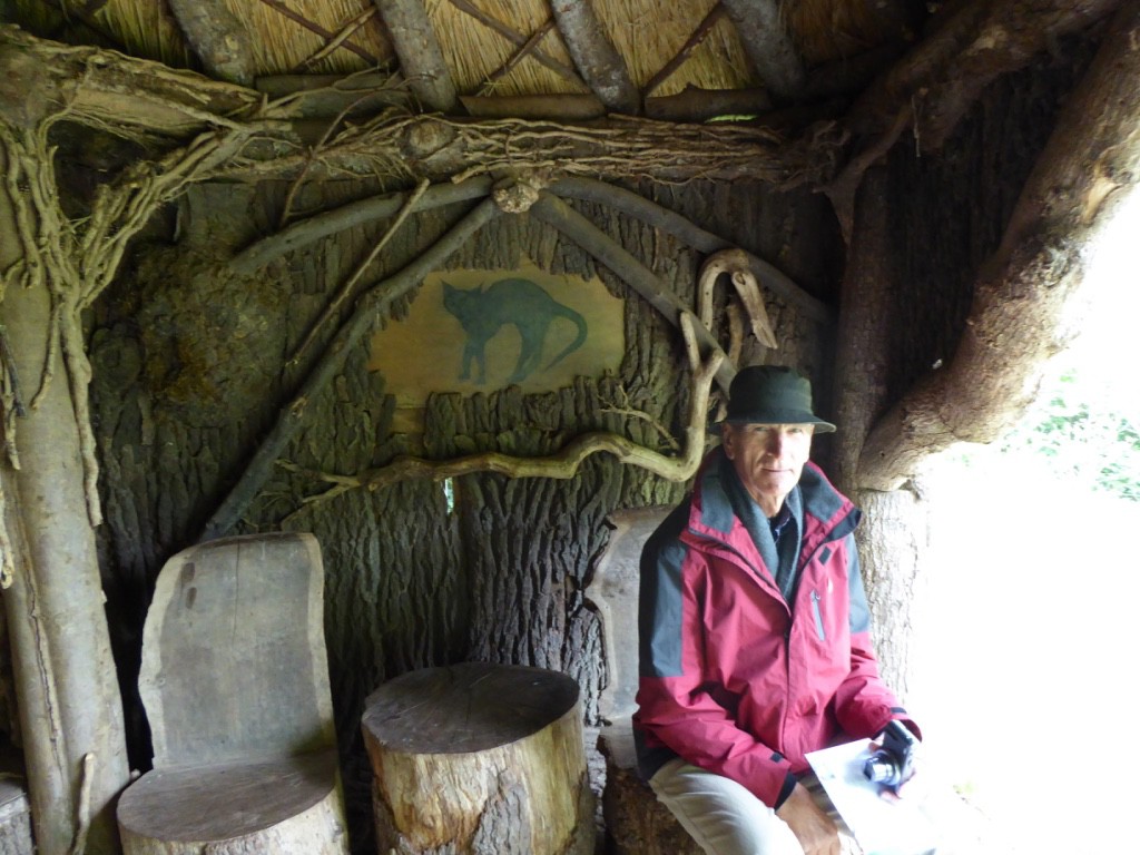 Grampsey sitting in the witches hut looking VERY serious