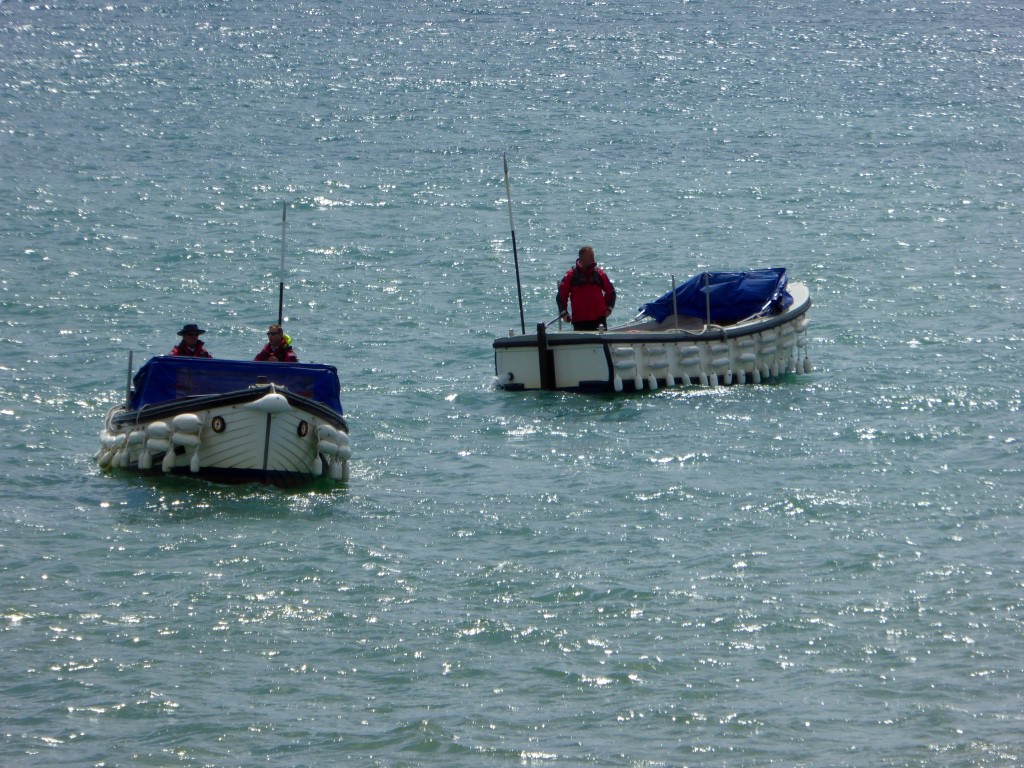 Two boatmen organising an ambulance