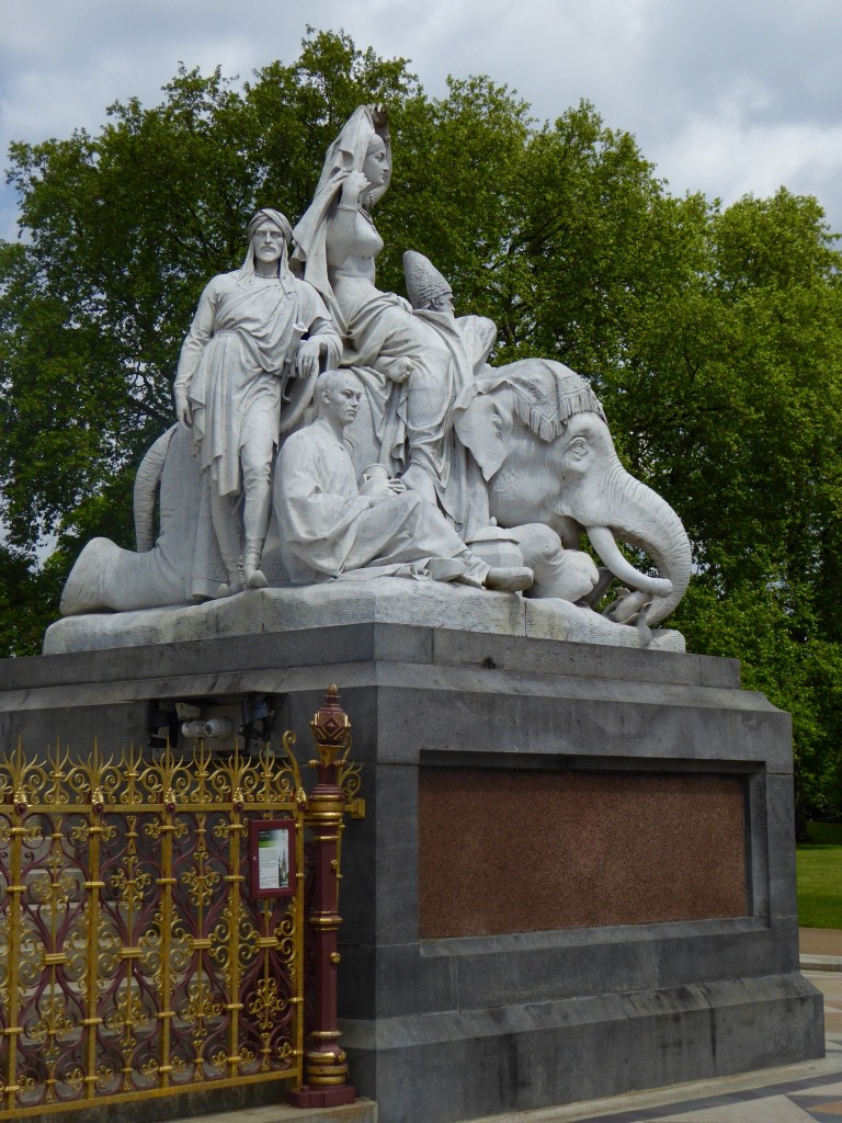 Marble figures representing  Asia on one corner of the memorial